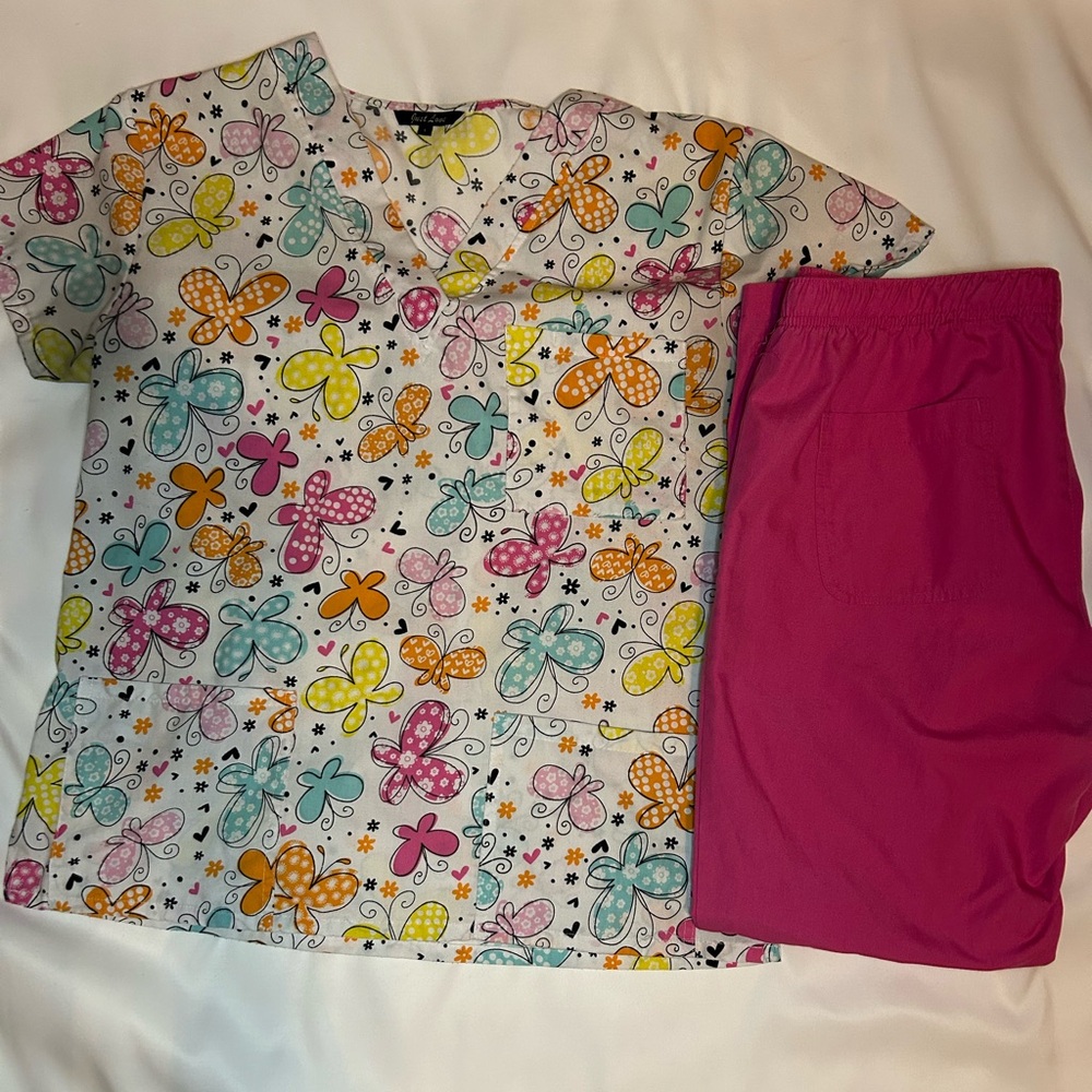 pink and white scrub set